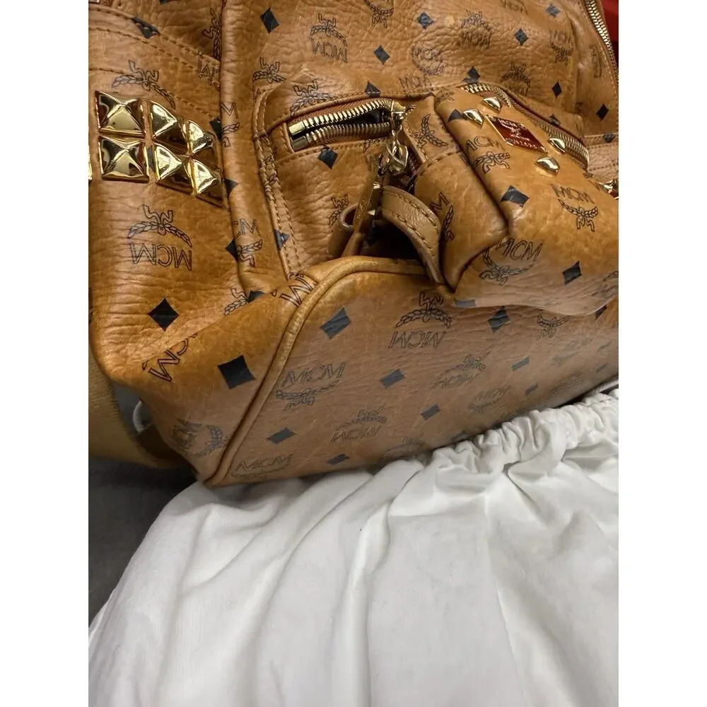 MCM Stark Side Studs Medium Cognac Visetos Backpack Pouch Dust Bag